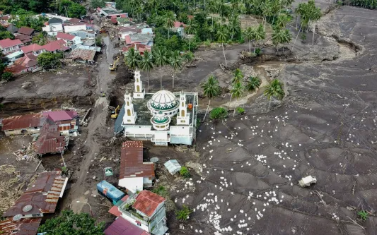 More than 40 dead after cold lava sweeps across village in Indonesia